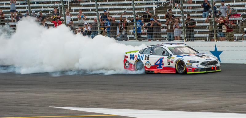Kevin Harvick doing a burnout after winning the Texas Motor Speedway Cup Series race in November. Photo credit: Brian Jones
